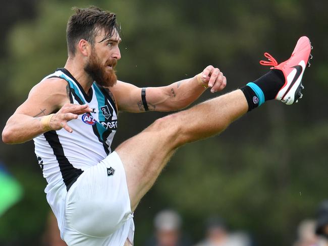 Charlie Dixon of the Power kicks a goal during the AFL Marsh Community Series pre-season match between the Brisbane Lions and the Port Adelaide Power at the Moreton Bay Central Sports Complex in Burpengary, Queensland, Sunday, February 23, 2020. (AAP Image/Darren England) NO ARCHIVING, EDITORIAL USE ONLY