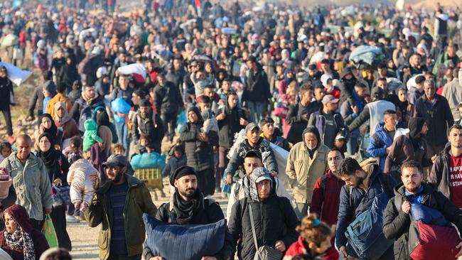 Displaced Gazans cross the Netzarim corridor from the southern Gaza Strip into Gaza City. Picture: AFP