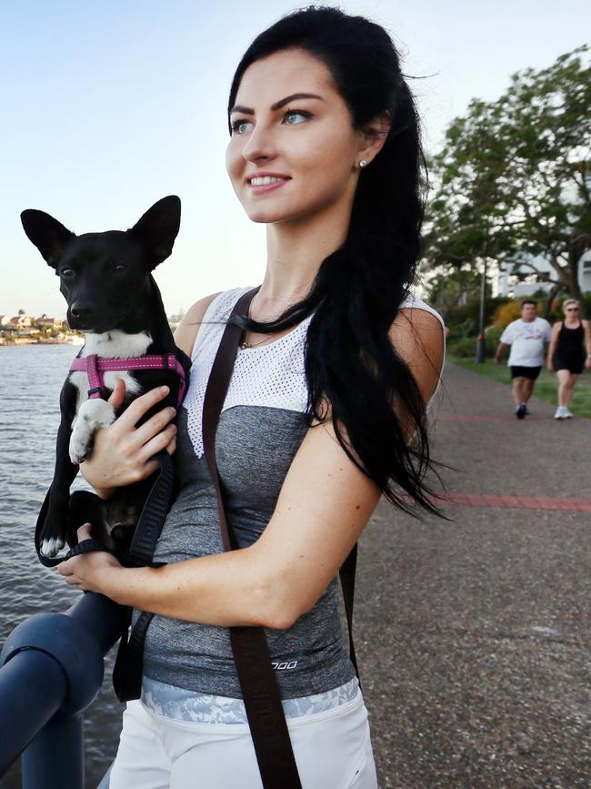 Katarina Kyle, with her 1-year-old fox terrier X chihuahua named Datsun, believes small dogs should be allowed on ferries. Pics Tara Croser.