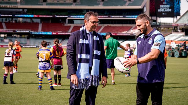 Premier Steven Marshall gets a lesson from NRL legend Robbie Farah. Picture: Mike Burton