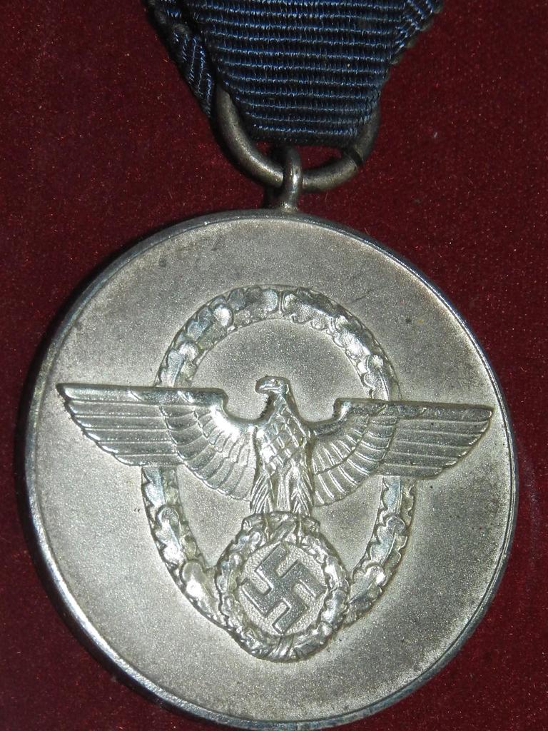 Eight year service medal. Supplied: Danielle Elizabeth Antique &amp; Estate Auctioneers