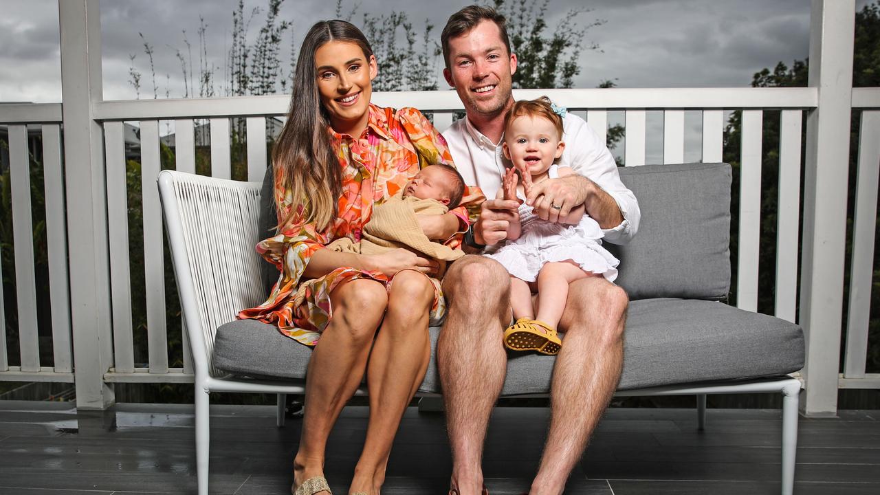 Brisbane Heat's new captain Jimmy Peirson alongside wife Amy and children Evelyn, 15 months and baby William. Picture: Zak Simmonds