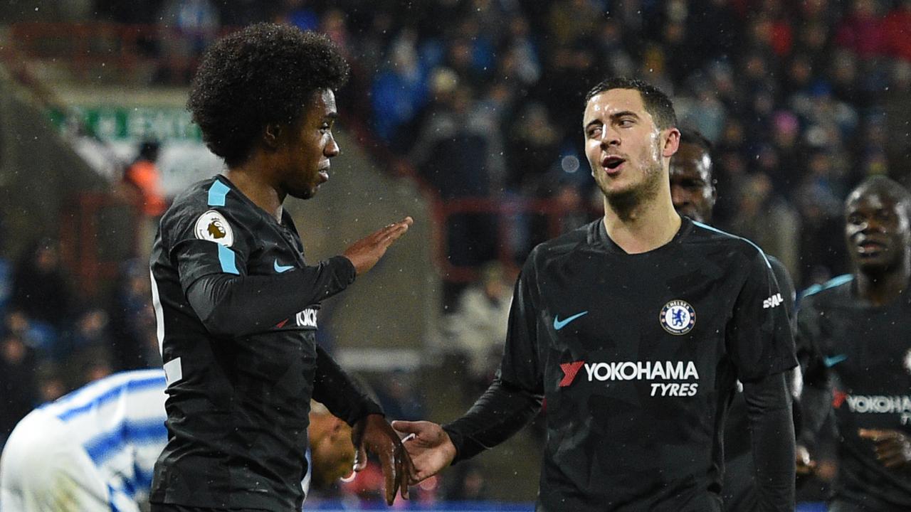 Chelsea's Brazilian midfielder Willian (L) celebrates with Chelsea's Belgian midfielder Eden Hazard (C)