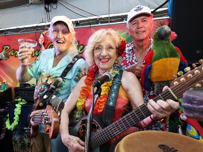 The Barbary Coasters have performed their popular Parrothead Party, playing the tropical rock music of the late Jimmy Buffett to hundreds of fans at the Yorkeys Knob Boating Club. Vance Fahey and Nikki Lowmass were joined by Brian Pitcher on bongo drums for the free concert, which was attended by over 200 Jimmy Buffet fans. Picture: Brendan Radke