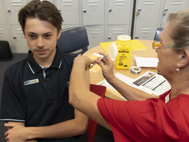 Covid-19 Vaccine rolling out to schools in Darwin this week Essington student yr 12 student Tyler Engels receives his first vaccine Picture Julianne Osborne