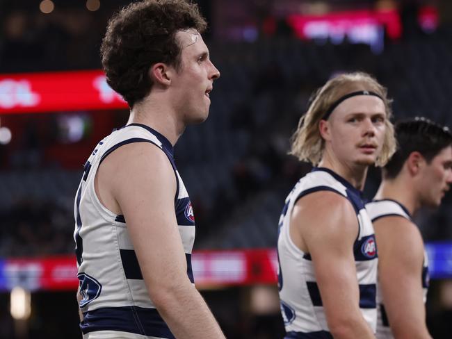 MELBOURNE, AUSTRALIA - AUGUST 17:  Dejected Geelong players walk from the ground after the round 23 AFL match between St Kilda Saints and Geelong Cats at Marvel Stadium, on August 17, 2024, in Melbourne, Australia. (Photo by Darrian Traynor/Getty Images)