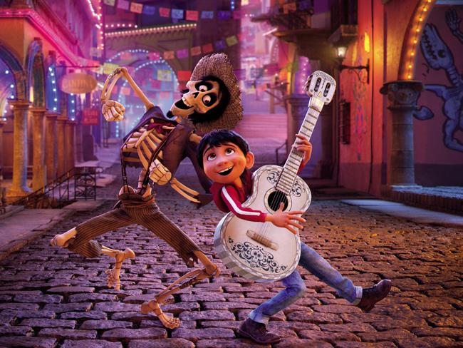 In a scene from Disney Pixar's animated film Coco, Miguel's (voiced by Anthony Gonzalez) love of music leads him to the Land of the Dead where he teams up with charming trickster Hector (Gael Garcia Bernal). © 2017 Disney Pixar. All Rights Reserved.