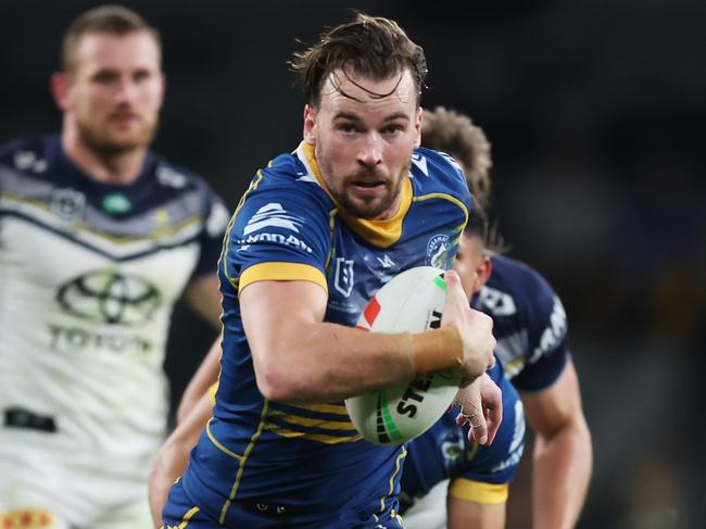 SYDNEY, AUSTRALIA - MAY 26: Clint Gutherson of the Eels makes a break during the round 13 NRL match between Parramatta Eels and North Queensland Cowboys at CommBank Stadium on May 26, 2023 in Sydney, Australia. (Photo by Mark Metcalfe/Getty Images)