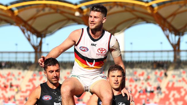 Bryce Gibbs, chaired off after his last AFL game, said he was worried about getting dropped during his stint at the Crows. Picture: Getty Images