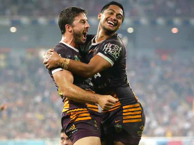 Ben Hunt celebrates his try with Anthony Milford. Pic Darren England.