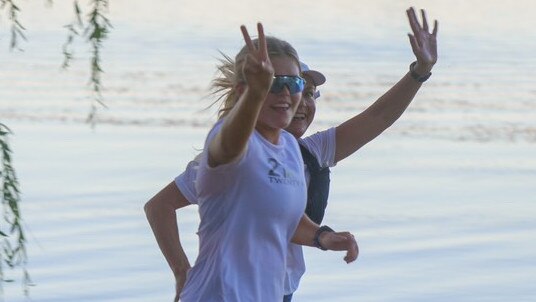 Delaney Troon waves as she completes one of her half marathons. Picture: Holly Draffin