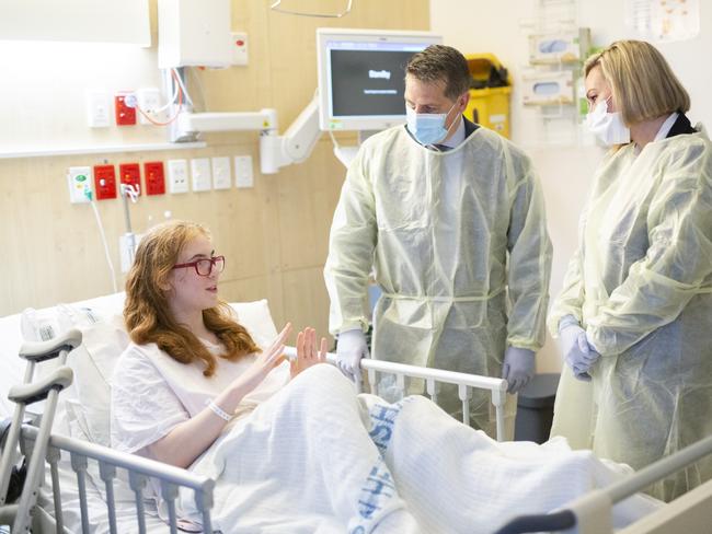 SYDNEY, AUSTRALIA - NCA NewsWire - 15 MAY, 2024: NSW Health Minister Ryan Park, Marjorie O’Neill and patient Amy inside Sydney Children's Hospital. The two Health workers are Elizabeth and Freya (both Nurse Unit Managers). 'Amy (14) was diagnosed with Adamantinoma, a particularly rare, cancerous tumour that starts in bones in 2021. Amy had 23cm of bone removed from her tibia and has been undergoing bone and skin grafting in her leg. Last Thursday, Amy underwent her 21st surgery to have another bone graft and is recovering well, hoping to be home by the weekend.' Picture: NCA NewsWire