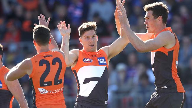 Josh Kelly (left), Toby Greene and Jeremy Cameron are the Giants’ prime movers. Pic: Phil Hillyard