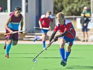 Darling Downs hockey player Carter Mogg takes on South Coast during the 13-19 years Boys Hockey State Championships. Picture: Nev Madsen