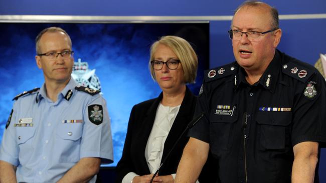 AFP assistant commissioner Ian McCartney, City of Melbourne Lord Mayor Sally Capp and Victoria Police chief commissioner Graham Ashton. Picture: Andrew Henshaw