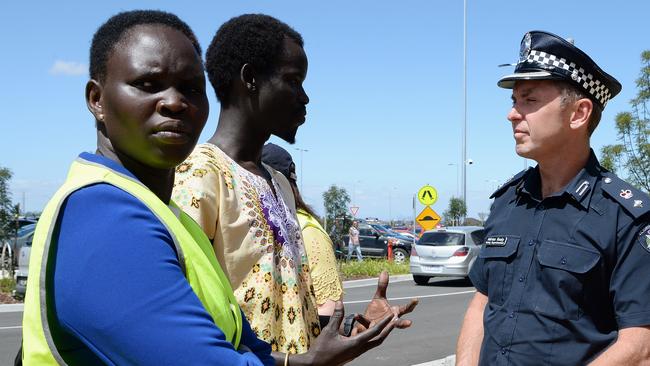 Acting Supt Adrian Healy talking with community leaders. PIcture: Lawrence Pinder