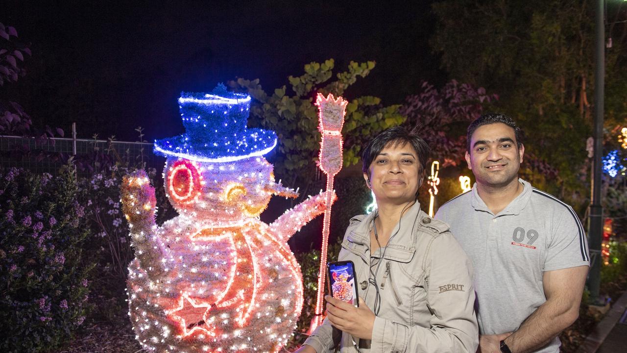 Sonica Parmar and her brother Pushkin Parmar. Toowoomba Christmas Wonderland in the Botanic Gardens, Queens Park. Saturday, December 3, 2022. Picture: Nev Madsen.