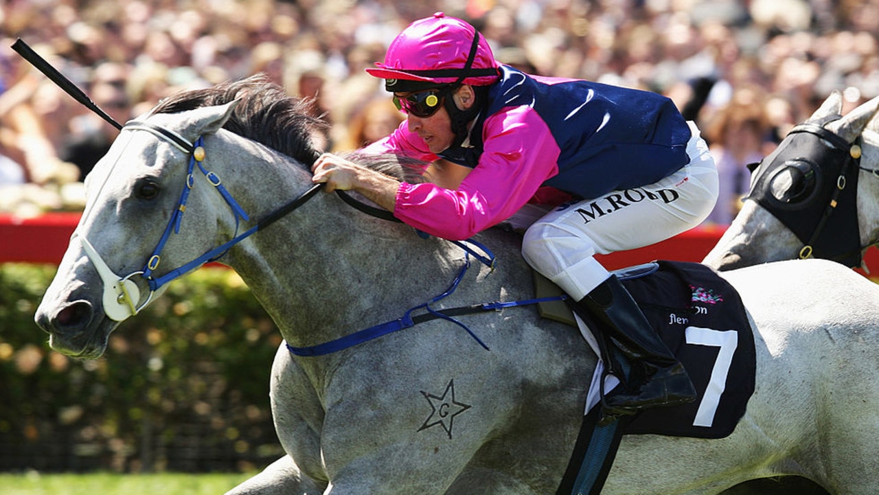 MELBOURNE, AUSTRALIA - NOVEMBER 05:  Jockey Michael Rodd riding Outlandish Lad wins the All Greys 1400 during the 2009 Crown Oaks Day meeting at Flemington Racecourse on November 5, 2009 in Melbourne, Australia.  (Photo by Mark Dadswell/Getty Images)