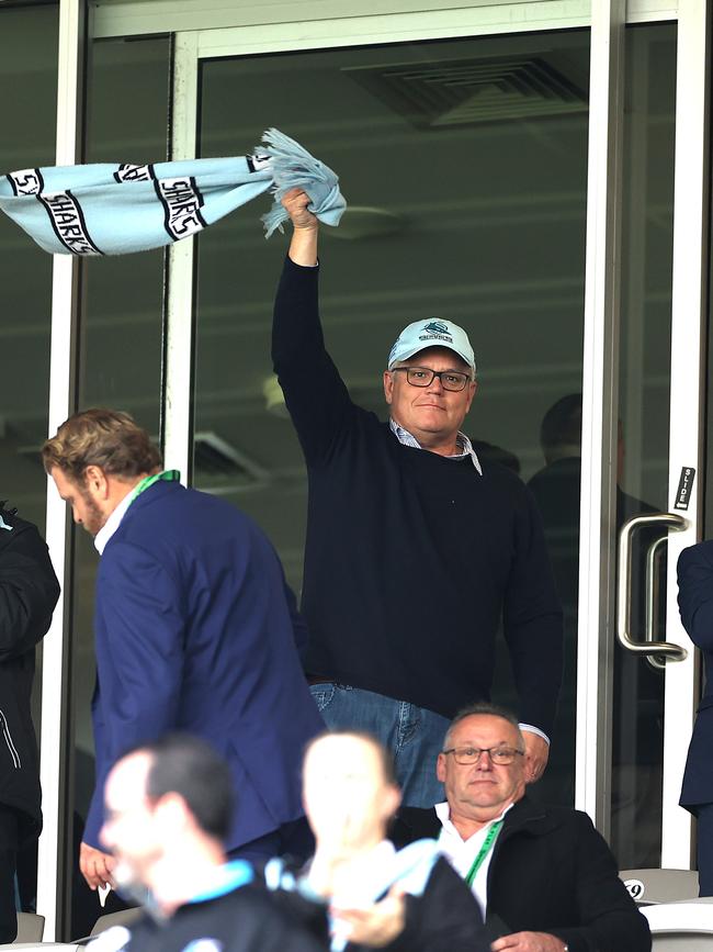 Prime Minister Scott Morrison cheers on the Cronulla Sharks at Kogarah Oval on Saturday. Picture: Phil Hillyard