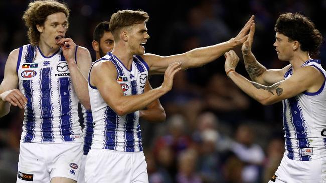 Mason Wood celebrates a goal during North Melbourne’s rousing win over Western Bulldogs. Picture: Daniel Pockett/AFL Media/Getty Images.