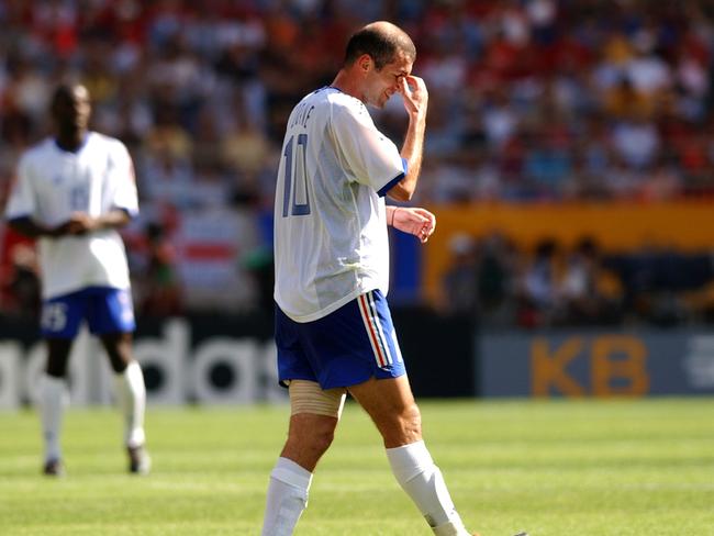 A dejected Zinedine Zidane at the 2002 World Cup, following defeat to Denmark. But worse was to come eight years later.