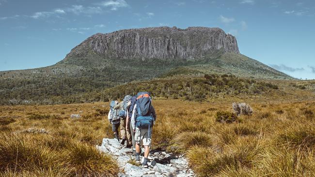 The Overland Track is an Australian bushwalking track, traversing Cradle Mountain-Lake St Clair National Park, within the Tasmanian Wilderness World Heritage Area. It's walked by more than nine thousand people each year, with numbers limited in the warmer months Photo – Tourism Tasmania Escape 10 Dec 2023 gift cover story