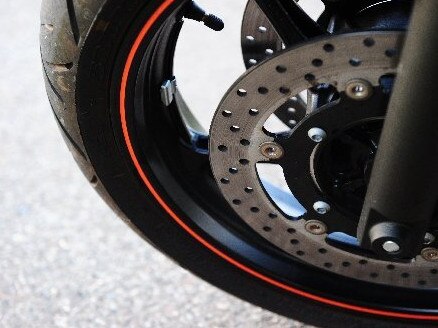A wife has spoken out about her husband's motorcycle crash to quash presumptions about speeding.