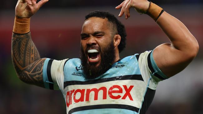 MELBOURNE, AUSTRALIA - MAY 11: Siosifa Talakai of the Sharks celebrates scoring a try during the round 10 NRL match between Melbourne Storm and Cronulla Sharks at AAMI Park on May 11, 2024 in Melbourne, Australia. (Photo by Graham Denholm/Getty Images)