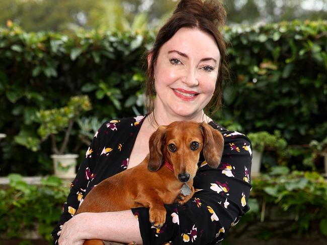 ***EMBARGOED UNTIL MONDAY FEBRUARY 15, 2021****Fashion designer Leona Edmiston pictured in her new range of clothes in a collaboration with Harris Scarfe. Leona holds her dog Daisy. Picture: Toby Zerna