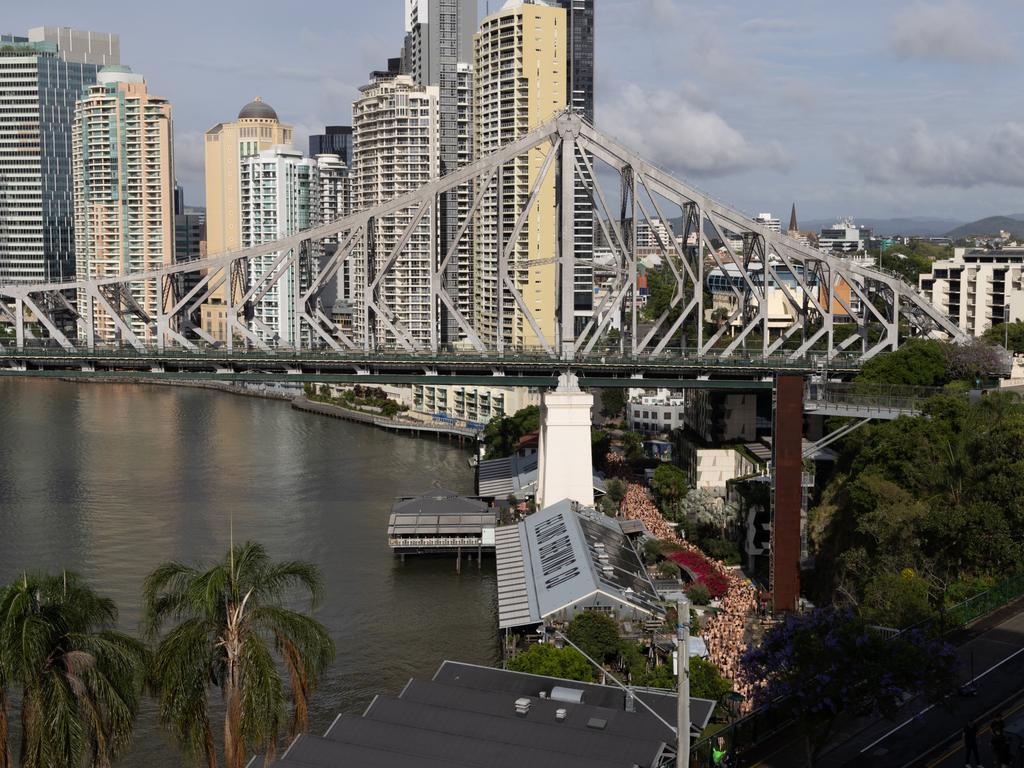 The models pass under Brisbane's Story Bridge. Picture: NewsWire/ David Kapernick