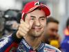 Spain's Jorge Lorenzo poses after taking pole position in the qualifying session for Sunday's MotoGP Japanese Motorcycle Grand Prix at the Twin Ring Motegi circuit in Motegi, north of Tokyo, Saturday, Oct. 10, 2015. (AP Photo/Shizuo Kambayashi)