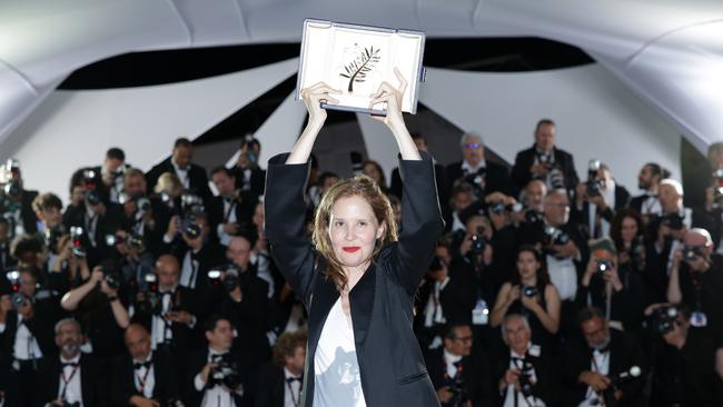 Justine Triet poses with The Palme d'Or Award at the 76th annual Cannes film festival. Picture: Getty Images