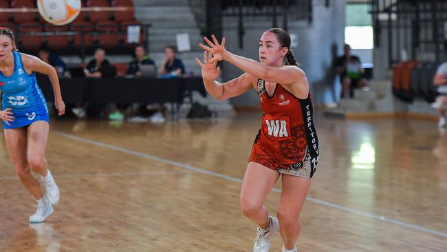 NT’s wing attack Molly Southam fires off the ball against NSW in the 2023 National Netball Championships. Picture: Pema Tamang Pakhrin