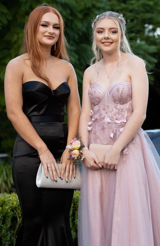 Bella Wright and Makenah Swinbourne graduating class of 2023, arrive at St Patricks Formal on Friday, May 5, 2023. Gympie, Queensland. Picture: Christine Schindler