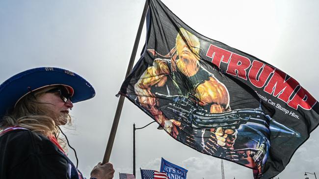 A supporter of former US president Donald Trump protests near his residence at Mar-A-Lago in Palm Beach, Florida. Picture: AFP