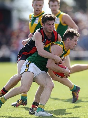 Gippsland Football League Grand Final match between Maffra Eagles and Leongatha Parrots. Maffra became the 2016 premiers, defeating Leongatha 13.10 (88) to 9. 16 (67). Kade Renooy tackels Brenton Fitzgerald. Picture: Yuri Kouzmin