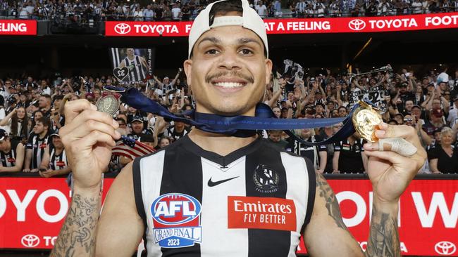 Hill with his premiership medal and Norm Smith. Picture: Getty Images