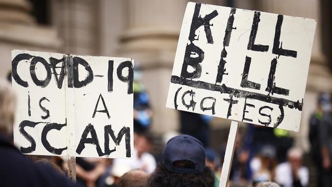 Incendiary signs at the protest on Tuesday. Picture: Daniel Pockett