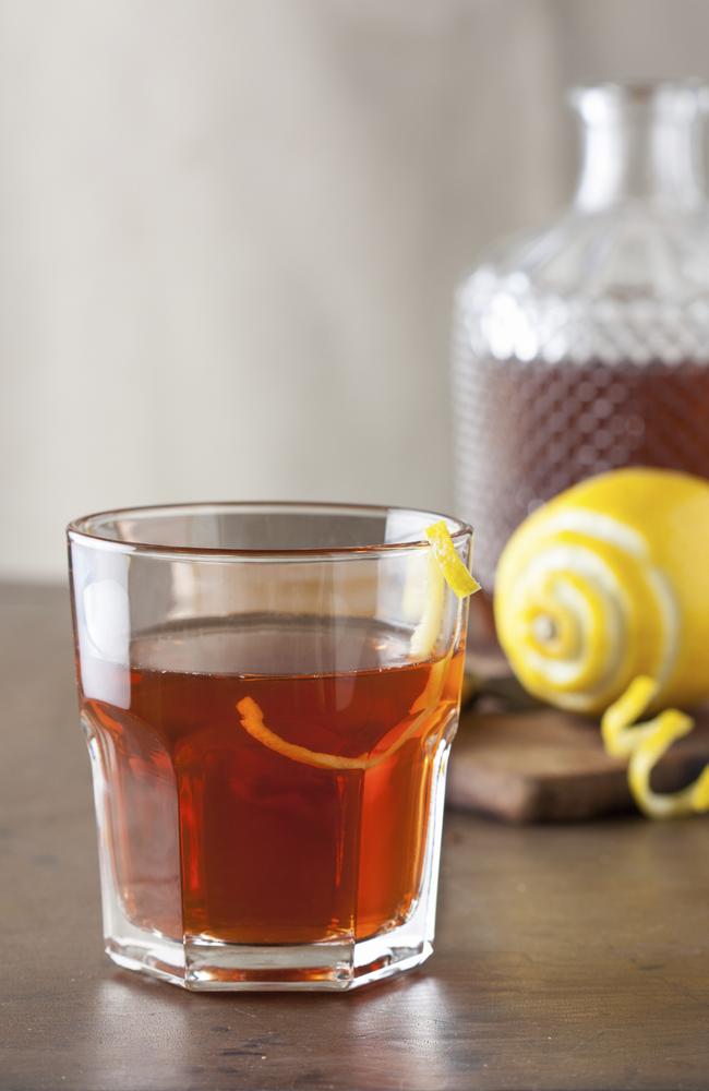 Classic sazerac cocktail with a lemon twist. Picture: iStock