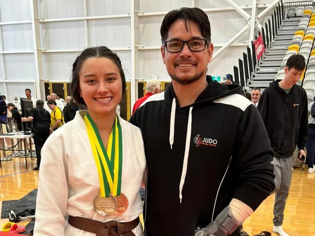 Cherese Freeland (left) and NT head coach Brad Fong. Picture: Judo NT.