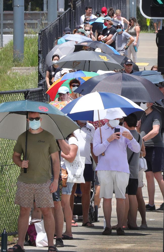 Huge queues snake around the block form the Gold Coast University Hospital COVID testing clinic. Picture Glenn Hampson