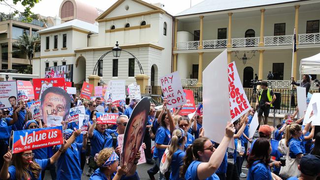 SYDNEY, AUSTRALIA : NewsWire Photos - NOVEMBER 13 2024; Nurses and midwives hold a 24-hour statewide strike, as frontline workers rally today. They march from Hyde Park down Elizabeth street to outside Parliament House in Sydney, with demands for fair wages, while patients across NSW will be left waiting. Picture: NewsWire / Gaye Gerard