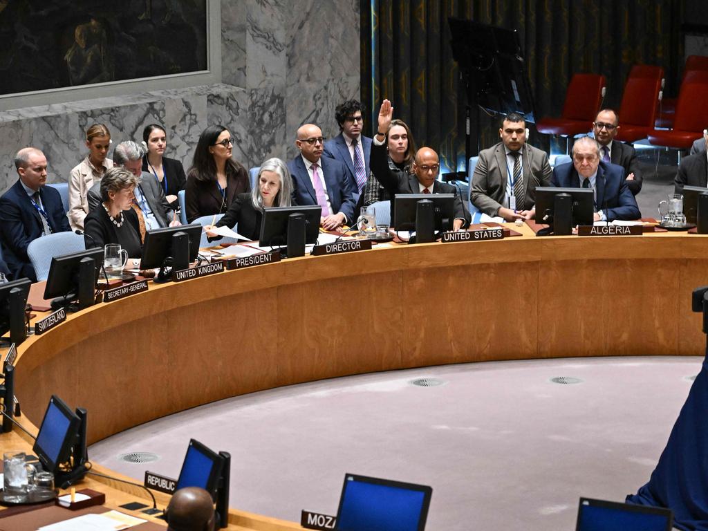 At the UN Security Council meeting in New York on November 20, US Alternate Ambassador to the United Nations Robert Wood raises his hand to veto a draft resolution calling for a ceasefire in Gaza that Washington said would have emboldened Hamas. Picture: Angela Weiss/AFP