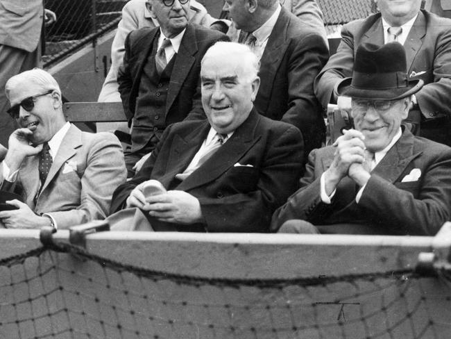 Sir Robert Menzies (centre) was Australia’s prime minister in 1954. Here he is enjoying a spot of tennis in Melbourne. Picture: HWT Library.