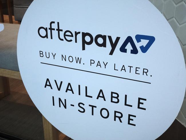 An Afterpay sign is seen in a store window in a shopping centre in Sydney, Tuesday, February 26, 2019. (AAP Image/Derek Rose) NO ARCHIVING