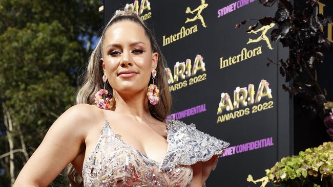 Reigan Derry on the red carpet of the 2022 ARIA Awards at the Hordern Pavilion, one year after she called organisers out for not recognising her as the voice of the Dreams cover. Picture: Jonathan Ng/The Daily Telegraph.