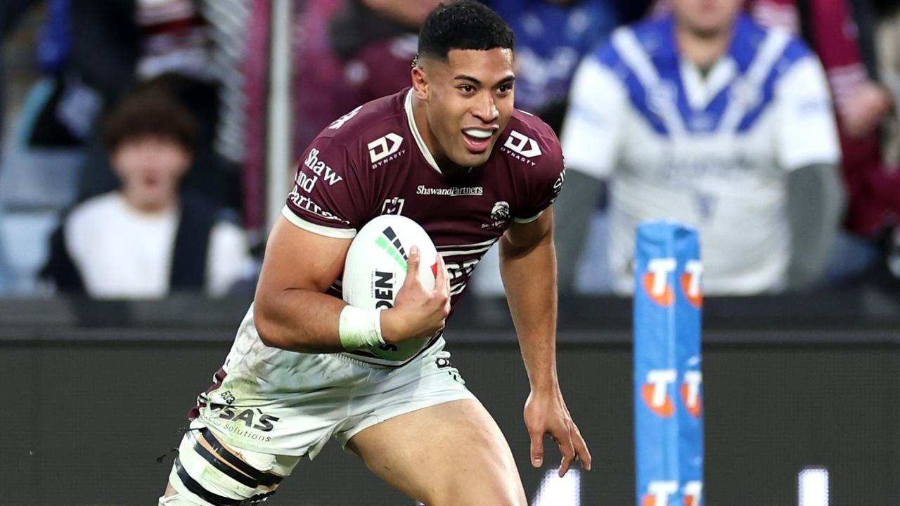 SYDNEY, AUSTRALIA - SEPTEMBER 15: Tolutau Koula of the Sea Eagles scores a try during the NRL Qualifying Final match between Canterbury Bulldogs and Manly Sea Eagles at Accor Stadium on September 15, 2024 in Sydney, Australia. (Photo by Cameron Spencer/Getty Images)