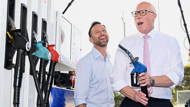 Peter Dutton and Liberal candidate for Moore, Vince Connelly, visit a fuel station to promote the Coalition’s plan to halve the fuel excise. Picture: Dan Peled/Getty Images