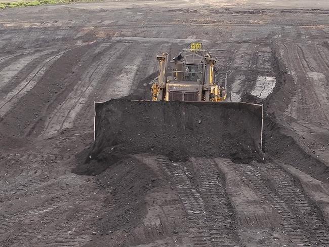 Anglo American is trialling new technology involving a remote-controlled stockpile dozer ahead of plans to retrofit the entire fleet.