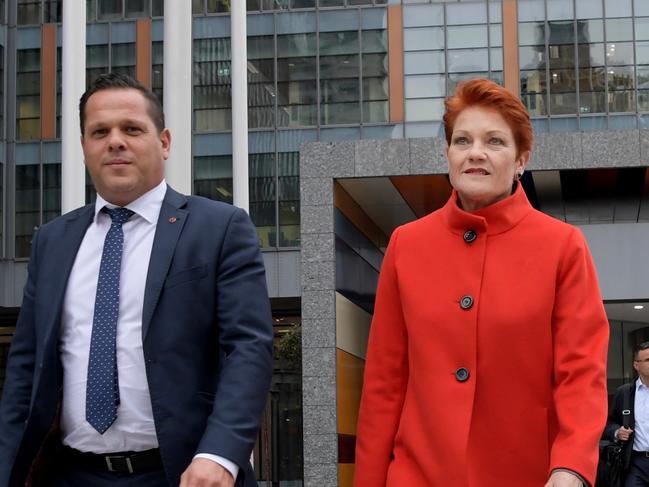 Senator Pauline Hanson (centre) with Senator Peter Georgiou (left) are seen leaving the Royal Commission into Misconduct in the Banking, Superannuation and Financial Services Industry at the Commonwealth Law Courts in Melbourne, Wednesday, May 23, 2018. (AAP Image/Tracey Nearmy) NO ARCHIVING, EDITORIAL USE ONLY